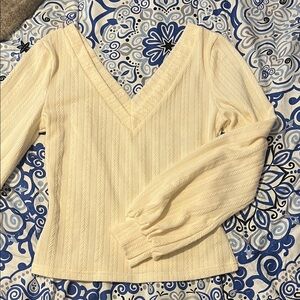 Cream V-Neck Sweater with Textured Pattern